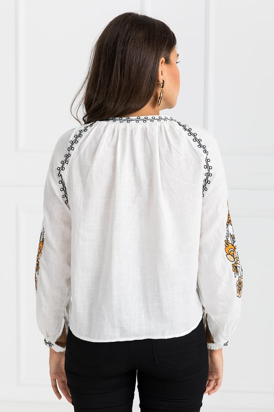 Trendy White long top-tunics with embroidery work for women