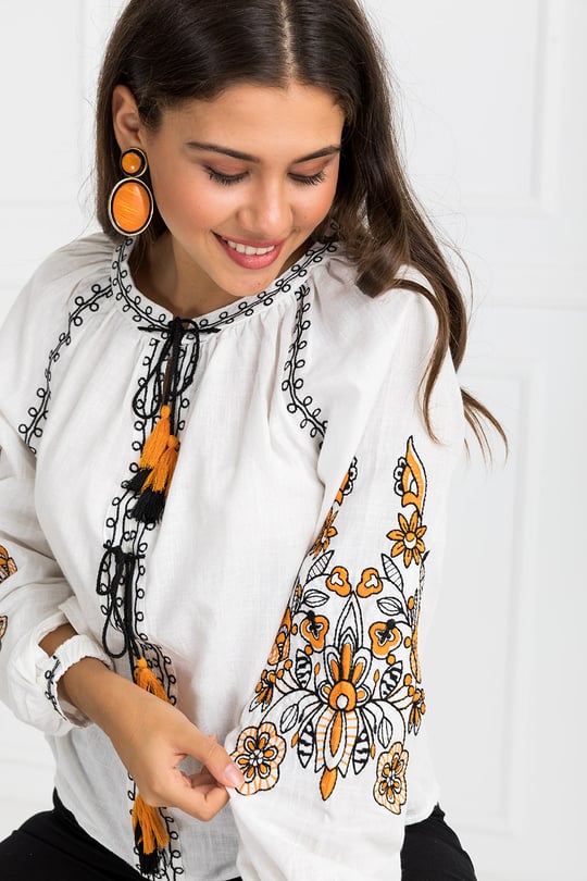 Trendy White long top-tunics with embroidery work for women